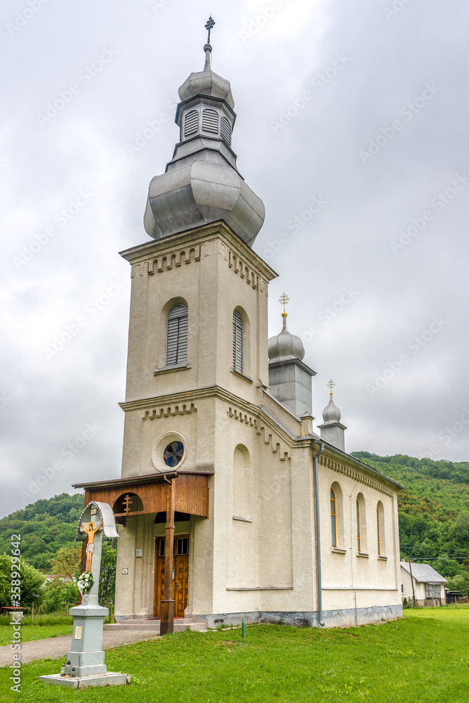 View at the Church of Assumption Blessed Virgin Mary in village Hunkovce, Slovakia