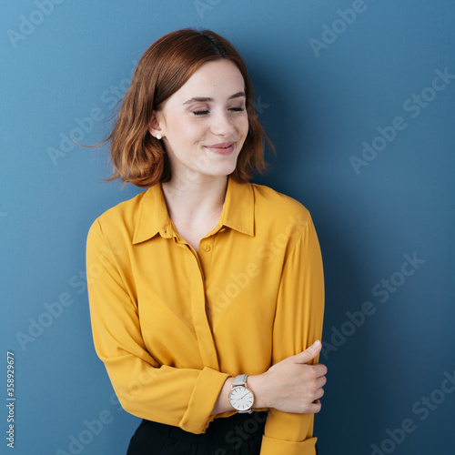 Blissful young woman taking a moment to relax