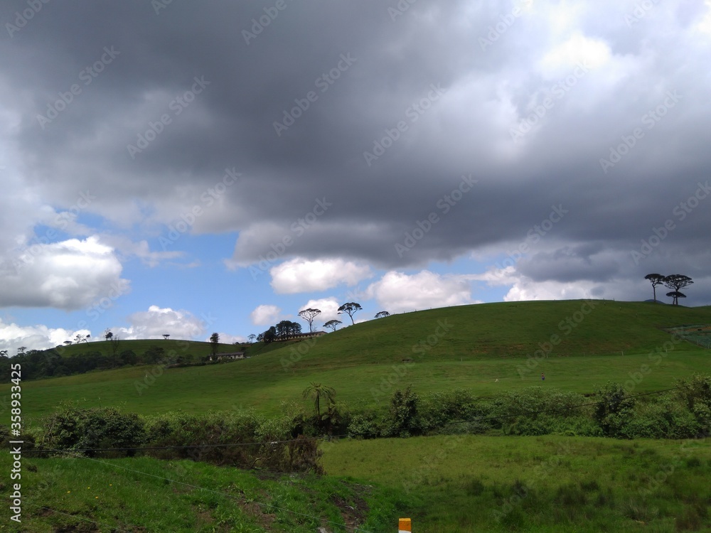 Fototapeta premium Clouds over the mountain village