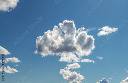 Blue sky with clouds.  Cloud-like a teddy bear, Pareidolia photo