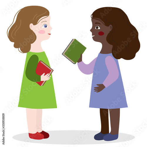 Two girls are talking about books at school. Schoolchildren communicate. Children are learning.