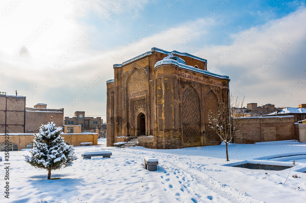 It's Gonbade Alavian in winter in Hamadan, Iran. Iran's Cultural Heritage
