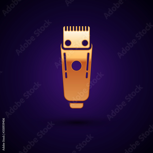 Gold Electrical hair clipper or shaver icon isolated on dark blue background. Barbershop symbol. Vector Illustration.
