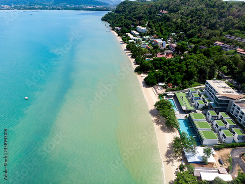 Beautiful top view of sandy beach and clear blue sea at Phuket Thailand.