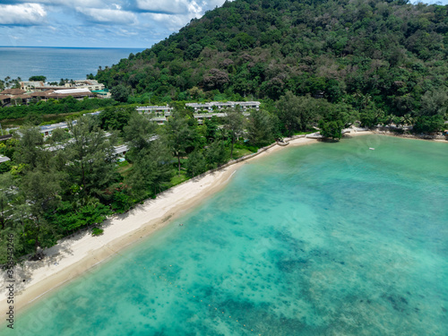 Beautiful top view of sandy beach and clear blue sea at Phuket Thailand.