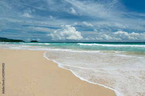 Quiet Karon beach in Phuket Thailand during locked down policy due to Covid-19. All beaches in Phuket are not allowed to enter.