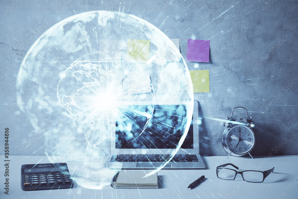 Double exposure of business theme icons and work space with computer background. Concept of success. Double exposure of business theme icons and work space with computer background. Concept of success.