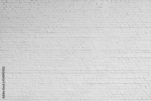 White brick wall. Designer interior background. Abstract architectural surface.