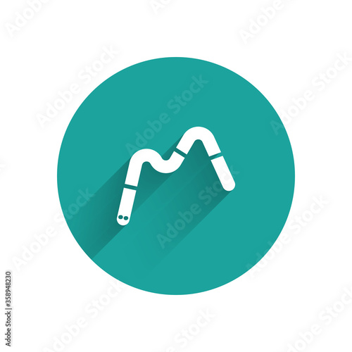 White Jelly worms candy icon isolated with long shadow. Green circle button. Vector.