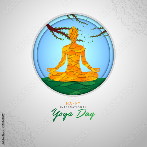 International Yoga Day International day of yoga do exercise or yoga on grey color background in orange yellow paper look layers Tree Grass and sky with 3d depth look in circle for your advertise.
