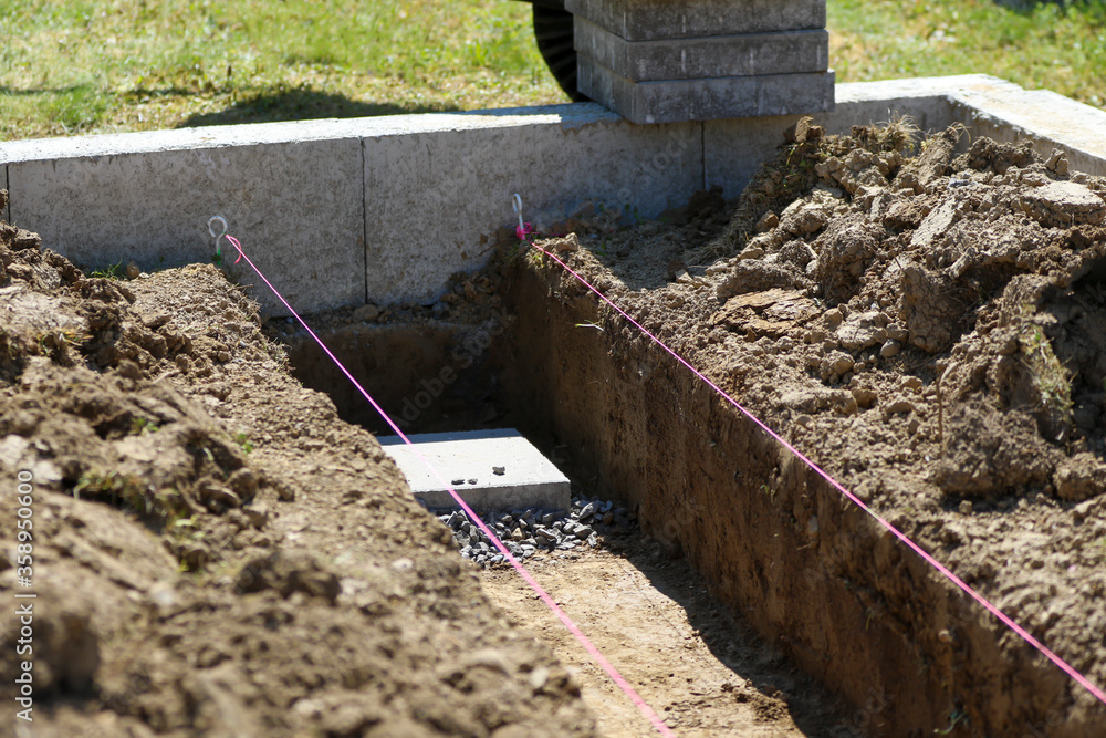 Preparation of foundations and internal sidewalk for the greenhouse. Preparation of foundations and internal sidewalk for the greenhouse.
