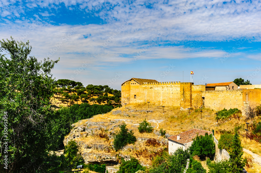 It's Wall around Segovia, a city in the autonomous region of Castile and Leon, Spain.