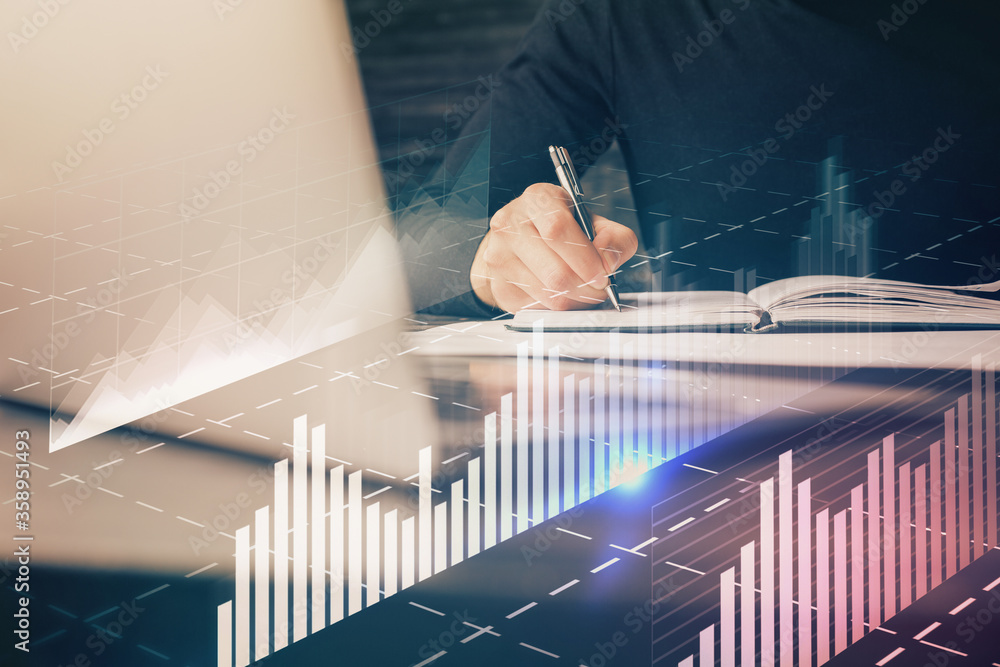 Double exposure of businessman with laptop and stock market forex chart. Double exposure of businessman with laptop and stock market forex chart.