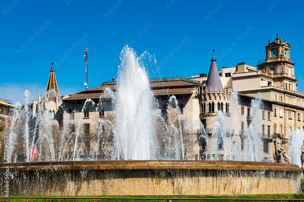 It's Architecture of the Plaza Catalnya (Catalonia Square). The Plaza occupies an area of about 50,000 m2 and it's considered to be the center of the city.