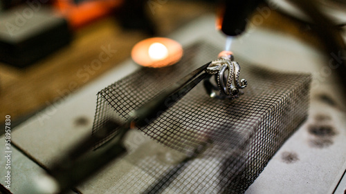 close-up. The jeweler makes a silver ring. On the island of Bali. Indonesia