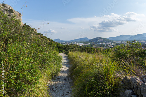 Rock formations and Mediterranean flora near Pollenca in Mallorca island, Spain