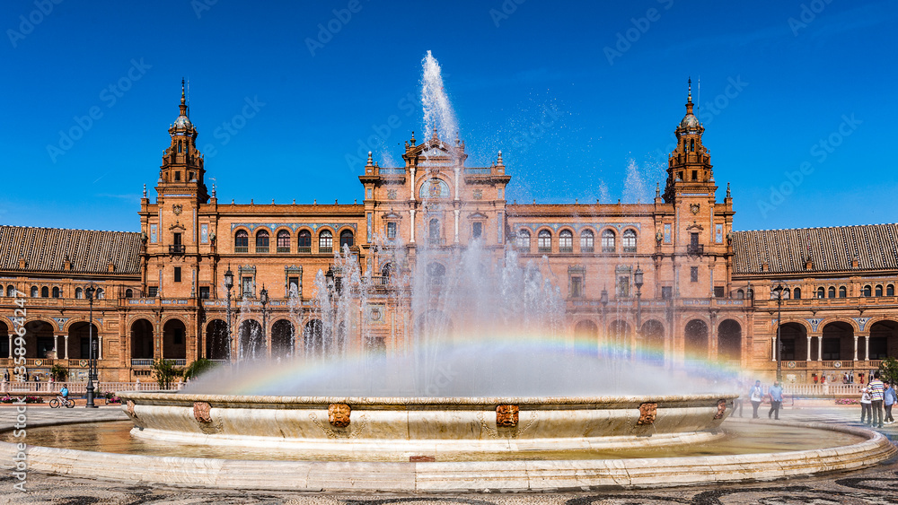 Obraz premium It's Central building and the fountain at the Plaza de Espana in Seville, Andalusia, Spain. It's example of the Renaissance Revival style in Spanish architecture.