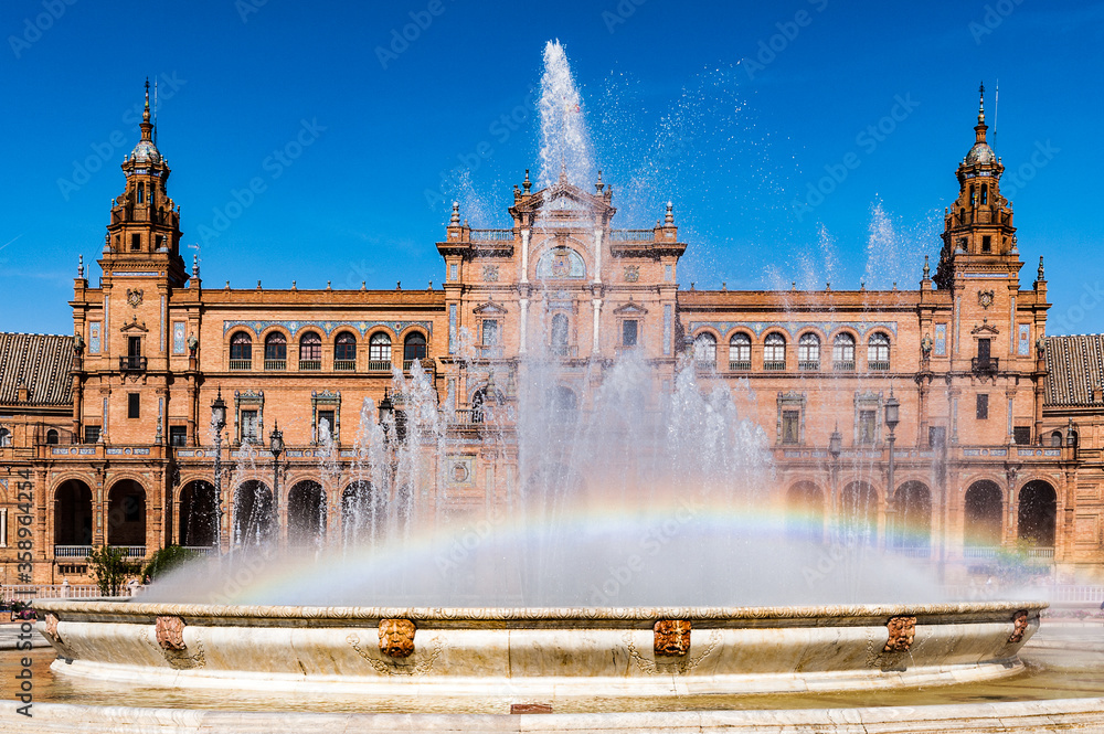 It's Central building and the fountain at the Plaza de Espana in Seville, Andalusia, Spain. It's example of the Renaissance Revival style in Spanish architecture.