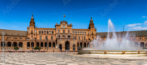 It's Central building and the fountain at the Plaza de Espana in Seville, Andalusia, Spain. It's example of the Renaissance Revival style in Spanish architecture.