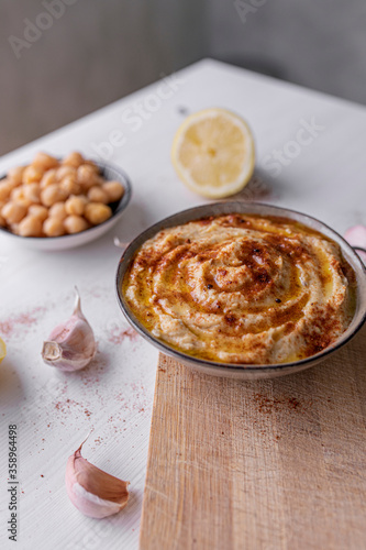 Traditional hummus with chickpeas, olive oil and lemon