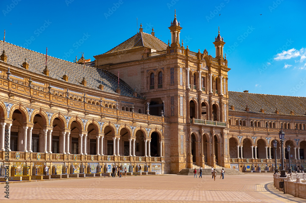 Fototapeta premium It's Part of the Central building at the Plaza de Espana in Seville, Andalusia, Spain. It's example of the Renaissance Revival style in Spanish architecture.