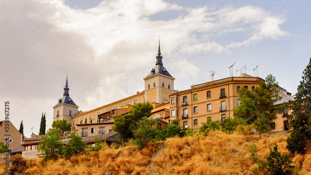Alcazar of Toledo, a stone fortification located in the highest part of Toledo, Spain. Alcazar of Toledo, a stone fortification located in the highest part of Toledo, Spain.