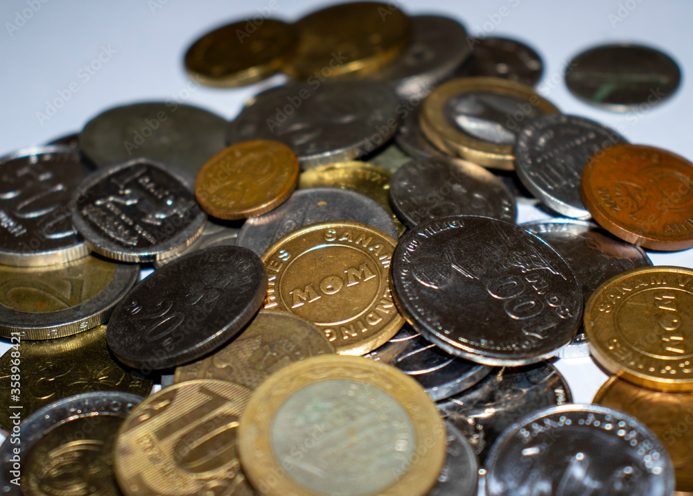 Coins and banknotes of different currencies Coins and banknotes of different currencies