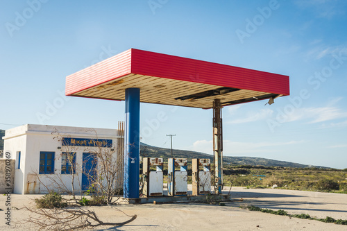 Abandoned gas station in the middle of nowhere. Old  gas pumps