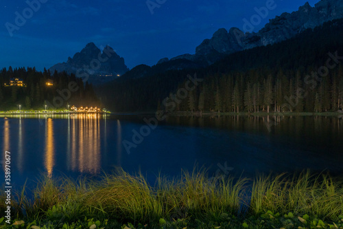 Fototapeta Naklejka Na Ścianę i Meble -  Night, blue hour lake in mountains, Lake Misurina in Dolomites, Italy