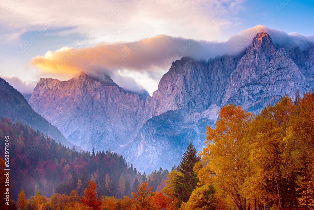 Obraz premium Triglav mountain peak at sunrise