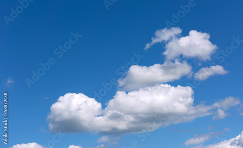 Fototapeta Naklejka Na Ścianę i Meble -  White clouds on blue sky background.