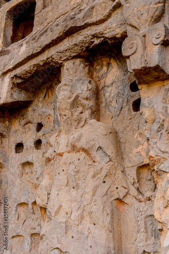 It's Longmen Grottoes ( Dragon's Gate Grottoes) or Longmen Caves.UNESCO World Heritage of tens of thousands of statues of Buddha and his disciples