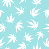 seamless pattern of cannabis leaves on a blue background. White hemp leaves. Marijuana pattern