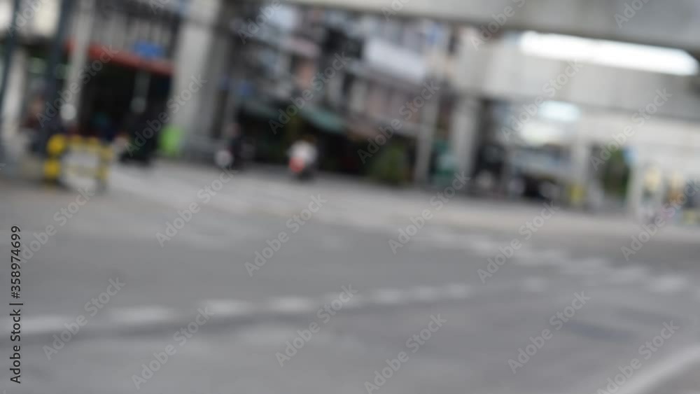 Blurred bokeh traffic on daytime roads in big cities. Blurred bokeh traffic on daytime roads in big cities.