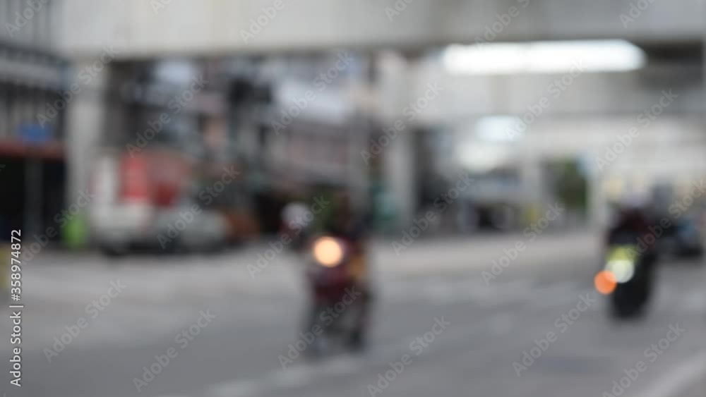 Blurred bokeh traffic on daytime roads in big cities. Blurred bokeh traffic on daytime roads in big cities.