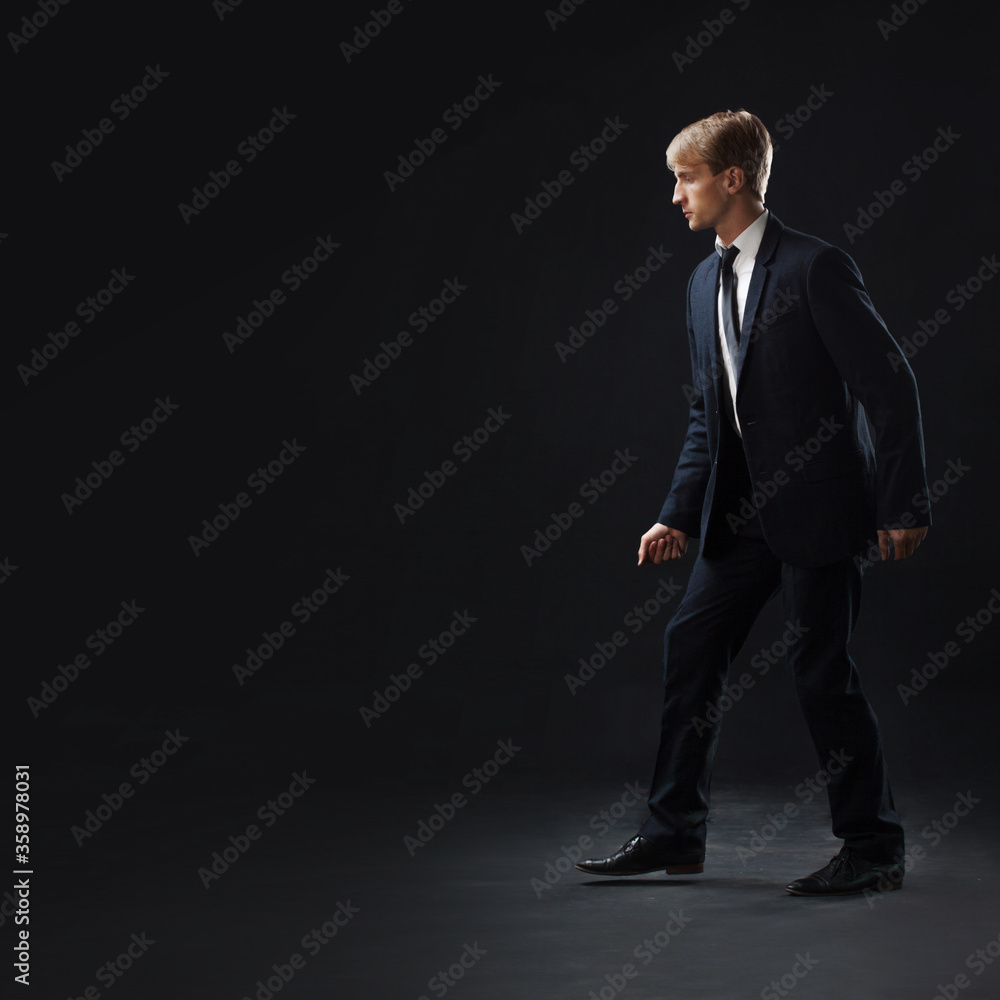 businessman takes a step into the unknown, anti-crisis management. businessman takes a step into the unknown, anti-crisis management.