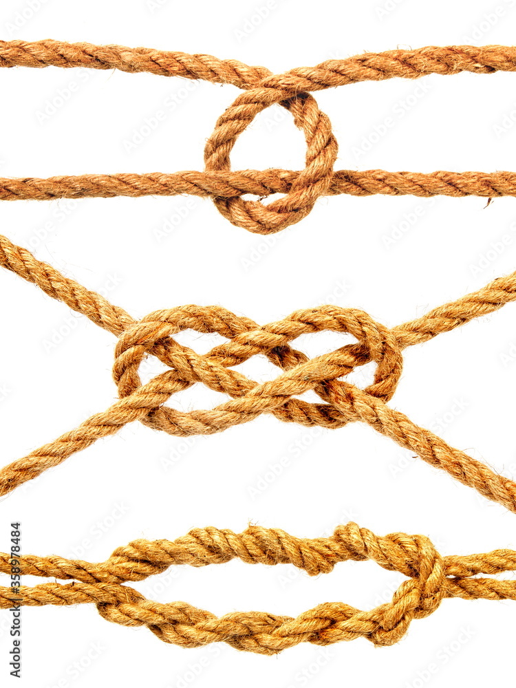 a small set of classic nautical knots tied from a rough natural rope and isolated on a white background a small set of classic nautical knots tied from a rough natural rope and isolated on a white background
