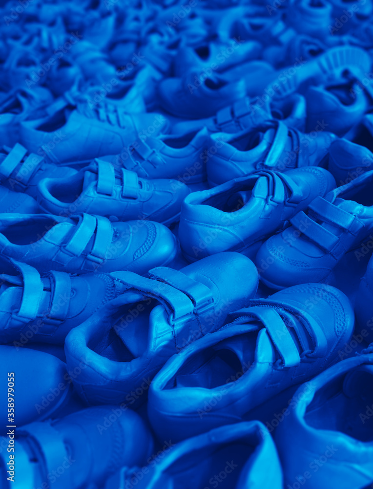 Obraz premium Blue shoes at the store background