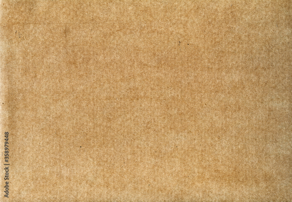 Texture of beige cardboard made of recycled paper Texture of beige cardboard made of recycled paper
