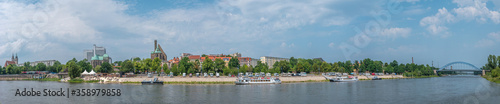Panoramic view over beach cafes, restaurants and camping site for campers at the downtown near Elbe river in Magdeburg, Germany, 2020 Summer