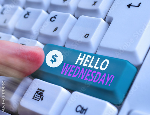 Conceptual hand writing showing Hello Wednesday. Concept meaning it is a good day when you reach in the middle of the week photo