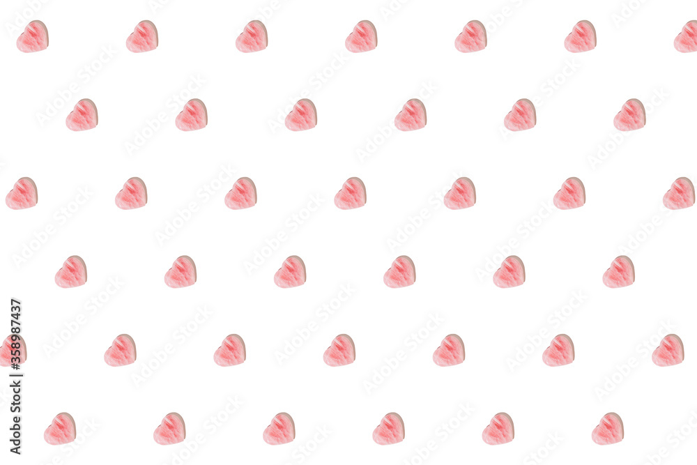 ose quartz heart on white background, love symbol, pattern. background.