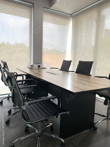 An empty business meeting room in modern office. Interior of meeting room. Home office, Classroom and Co-working space.