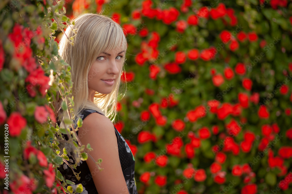 Young blond girl in dark dress Young blond girl in dark dress