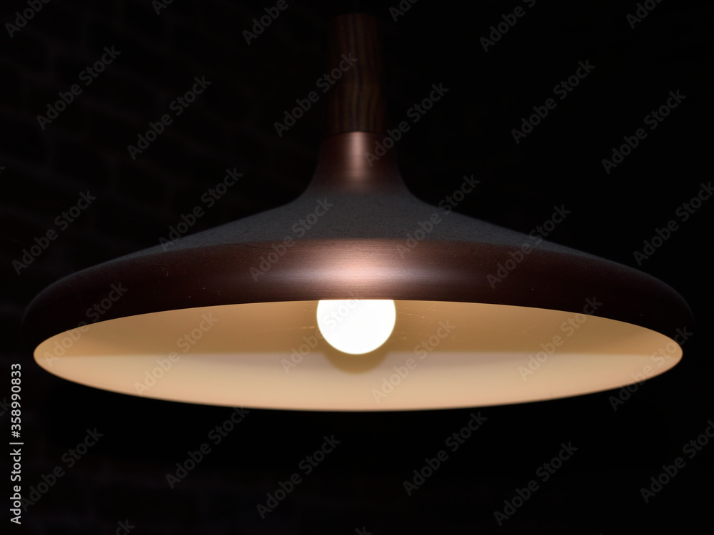 Isolated metalic chandelier covered with dust. brass color