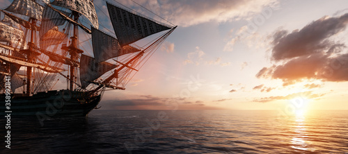 Fotografering Pirate ship sailing on the ocean at sunset
