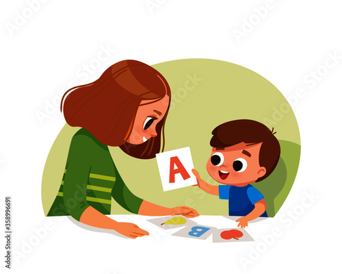 Child learning letters with mother. Early education. Learning alphabet with cards.