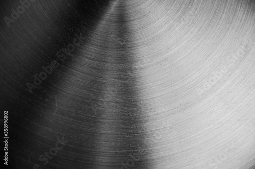 Texture of polished metal circle, pure metal background.

