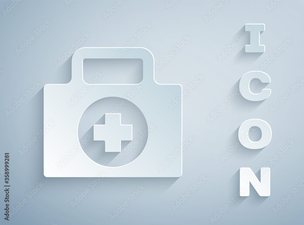 Paper cut First aid kit icon isolated on grey background. Medical box with cross. Medical equipment for emergency. Healthcare concept. Paper art style. Vector Illustration. Paper cut First aid kit icon isolated on grey background. Medical box with cross. Medical equipment for emergency. Healthcare concept. Paper art style. Vector Illustration.