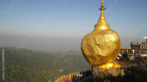 Local pilgrims at the buddhist site Kyaiktiyo Golden Rock Pagoda near Yangon, Burma. photo